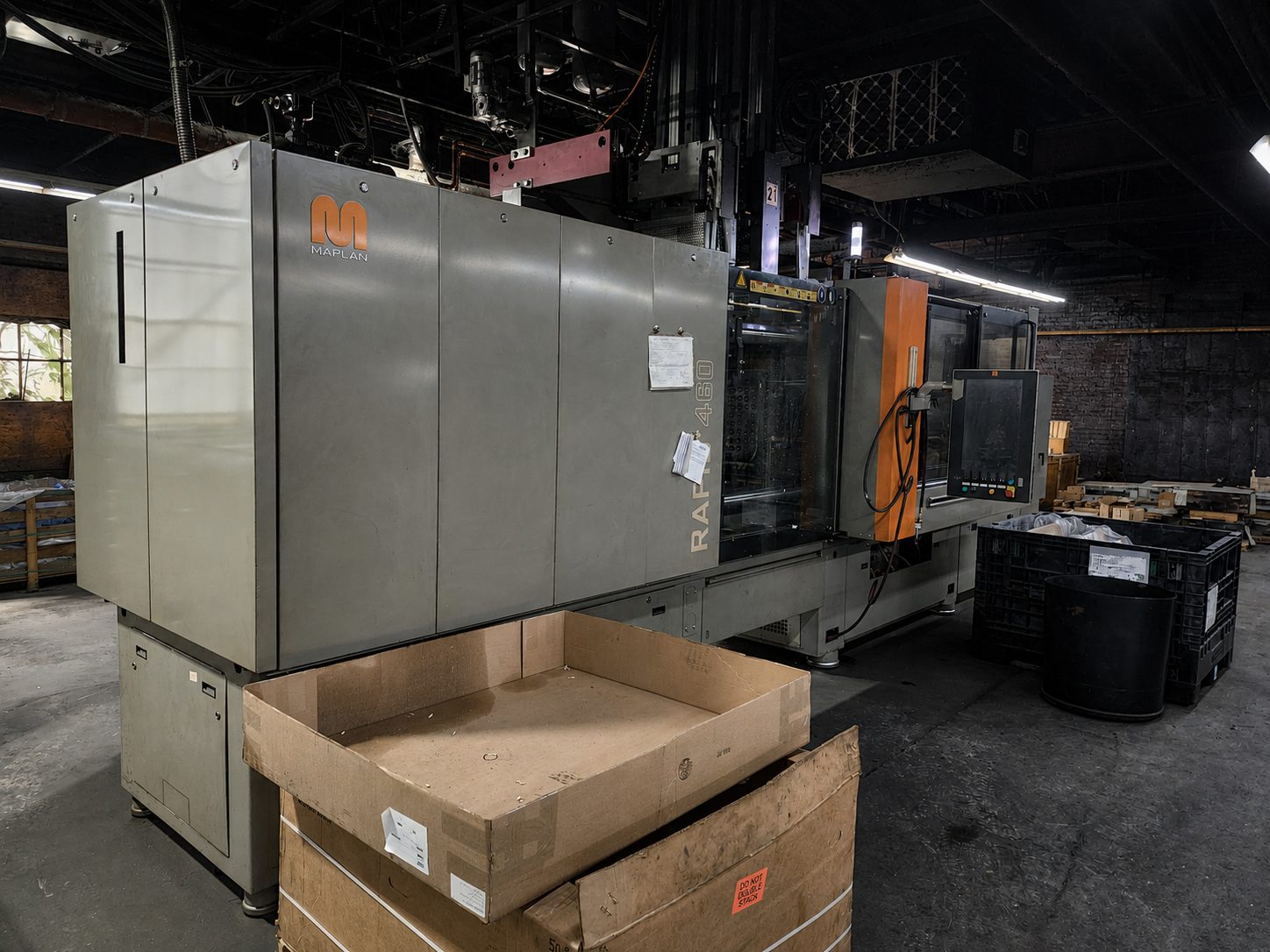MAPLAN rubber injection molding press on the Corry Rubber production floor